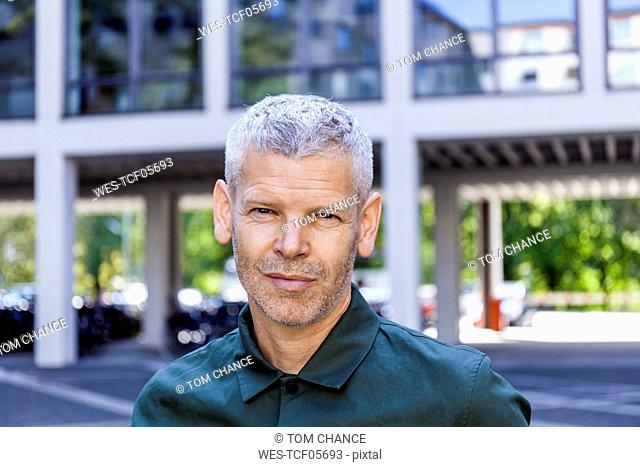 Portrait of a confident mature man in the city