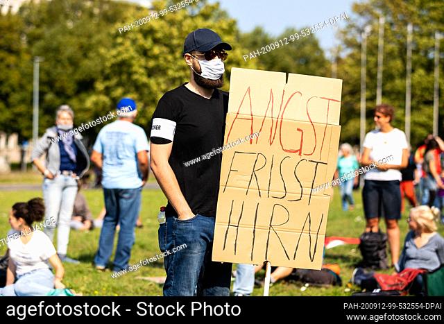 12 September 2020, Lower Saxony, Hanover: ""Fear eats brains"" can be read on the poster of a demonstrator at a demonstration against the Corona measures in the...