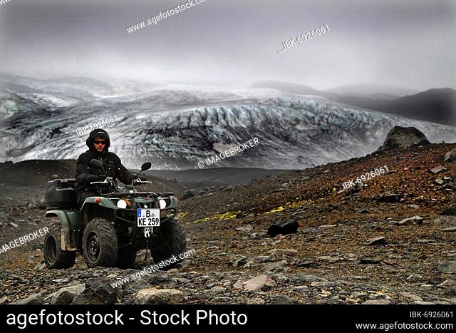 Glacier edge, Glacier, ATV rider, Biker, Quad, Yamaha Grizzly, Lava desert Krepputunga, Öskjuleið, Kverkfjöll, Vatnajökull glacier, Highlands, Central Iceland