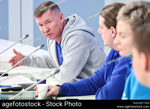 RUSSIA, MOSCOW - DECEMBER 12, 2023: The head of the expedition, Clean Arctic Project leader Andrei Nagibin (back) speaks during a press conference to discuss...