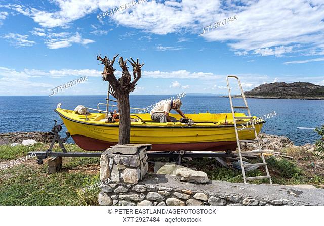 Boat maintainance in the fishing village of Trahila, in the Outer Mani, Southern Peloponnese, Greece