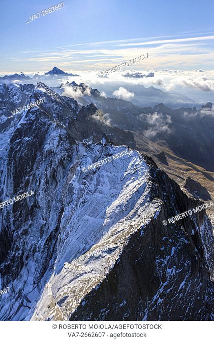 Flying over the north wall of the Piz Badile located between Masino and Val Bregaglia borders Italy Switzerland Europe