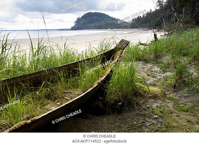 Haida dugout cedar canoe on Agate Beach, with Tow Hill shown, Haida Gwaii, formerly known as Queen Charlotte Islands, British Columbia, Canada