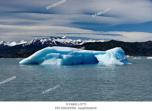 Spectacular blue iceberg floating on the Lake Argentino in the Los Glaciares National Park, Patagonia, Argentina
