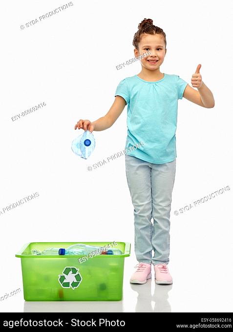 girl sorting plastic waste and showing thumbs up