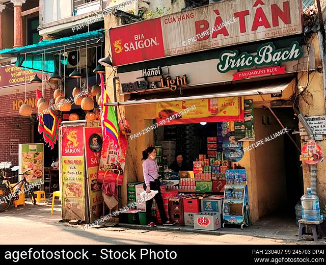 26 February 2023, Vietnam, Hanoi: Stores in a street in the Old Quarter. Photo: Alexandra Schuler/dpa. - Hanoi/Vietnam