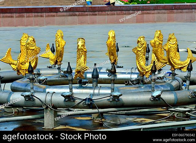 Moscow, Russia - august 12, 2019: The Peoples Friendship, Friendship of Nations, fountain with golden statues at VDNKh in Moscow