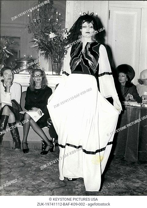 Nov. 12, 1974 - Thea Porter presented his new ready-to-wear spring collection for 1975 at Maxim's. A model wearing one of his designs is pictured here with...