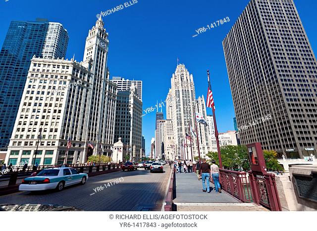 View along N Michigan Ave Bridge showing the Tribune Tower and Wrigley Building in Chicago, IL, USA