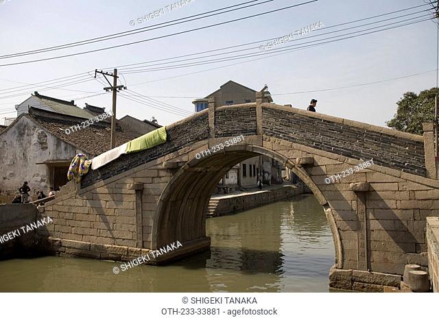 An ancient bridge across the canal, Suzhou, China