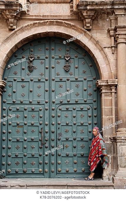The entrance door to Capilla de San Ignacio de Loyola on Plaza de Armas, Cuzco, Peru