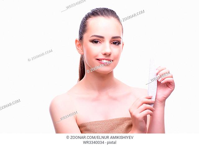 Woman in beauty concept with nail file