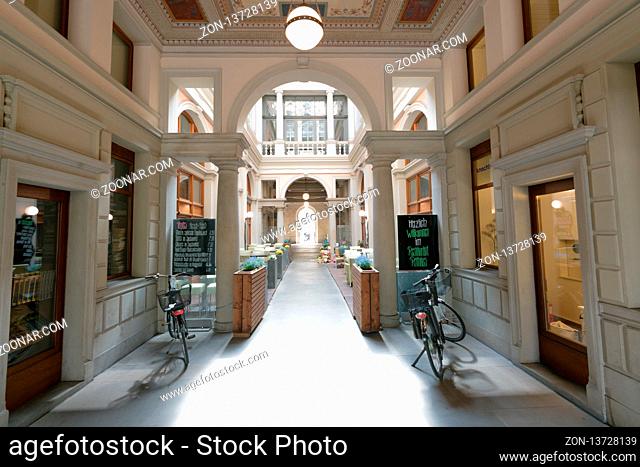 Winterthur, ZH / Switzerland - April 8, 2019: narrow covered alley in the historic old city of Winterthur in Switzerland with traditional Jugenstil or Art...