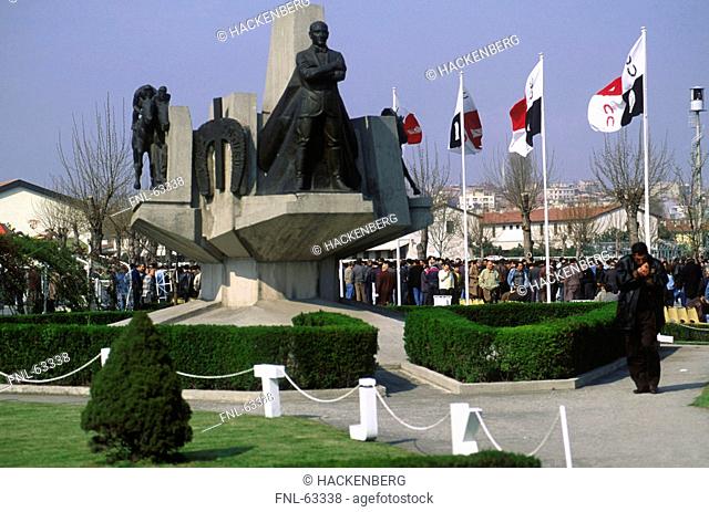 Tourists at monument, Taksin Square, Cumhuriyet Aniti Monument , Istanbul, Turkey