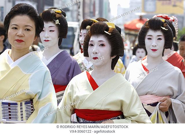 Geishas walk towards Sensoji Temple during the Daigyoretsu or Large Parade of Sanja Matsuri Festival in Asakusa on May 18, 2018, Tokyo, Japan