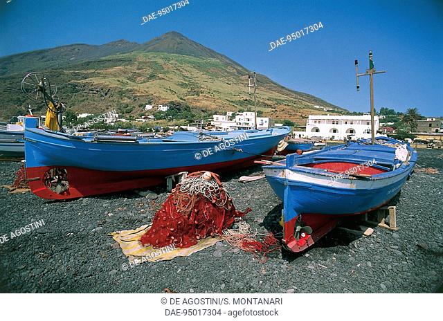 Fishing boats docked on dry land in Scari port, Stromboli, Aeolian islands, Sicily, Italy