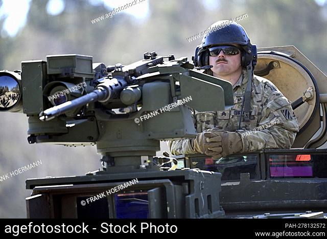 Tank gunner of a US tank sits on the command post. Prime Minister Dr. Markus Soeder visits the US military training area Grafenwoehr