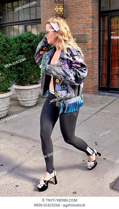 Rita Ora leaving her hotel in New York wearing o Paco Rabanne outfit with a floral printed leather jacket Featuring: Rita Ora Where: Manhattan, New York