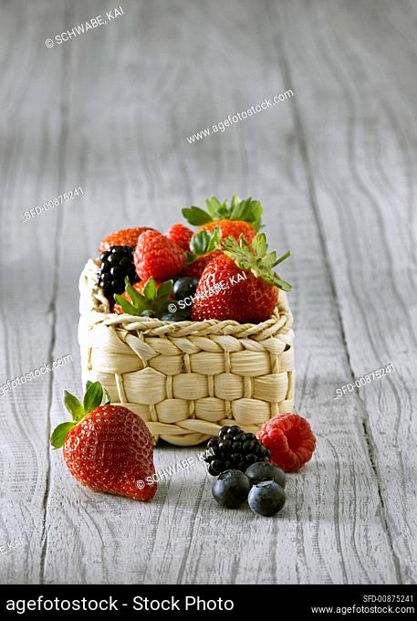 Mixed berries in a small basket