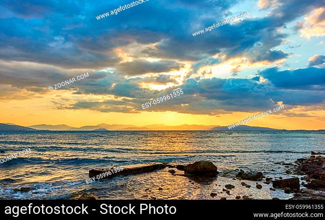 Beautiful sunset with colorful clouds over the sea - Panoramic sundown seascape - landscape