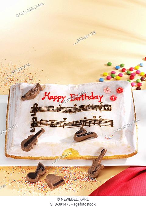 Birthday cake with chocolate musical instruments