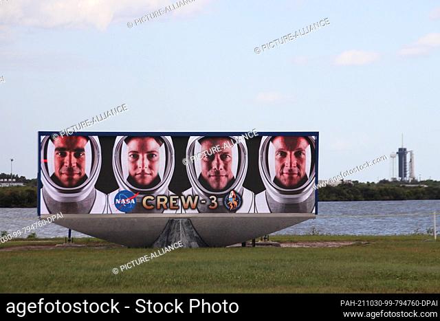 29 October 2021, US, Cape Canaveral: A video screen shows the faces of the four astronauts of Crew-3 (l-r): Raja Chari, Kayla Barron