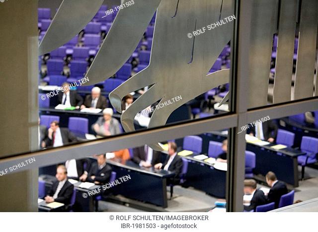 Deutscher Bundestag, German parliament, session in the plenary hall of the Reichstag building, parts of the federal eagle at front, Berlin, Germany, Europe