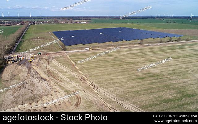 16 March 2020, Brandenburg, Werneuchen: The ""Weesow-Willmersdorf"" solar park is to be built on the open space in the foreground (aerial photo with a drone)