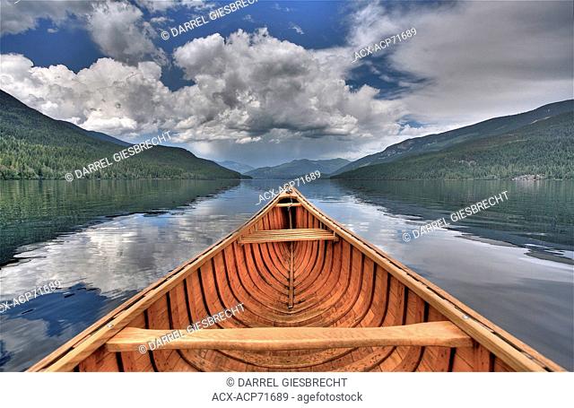 canvas canoe on Watchan Lake, British Columbia, Canada, multiple exposure, Darrel Giesbrecht