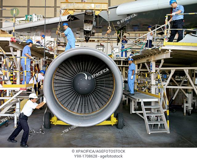 Workers in a maintenance aviation facility at the SIA Engineering Company in Singapore SIA Engineering Company Limited is a major provider of aircraft...