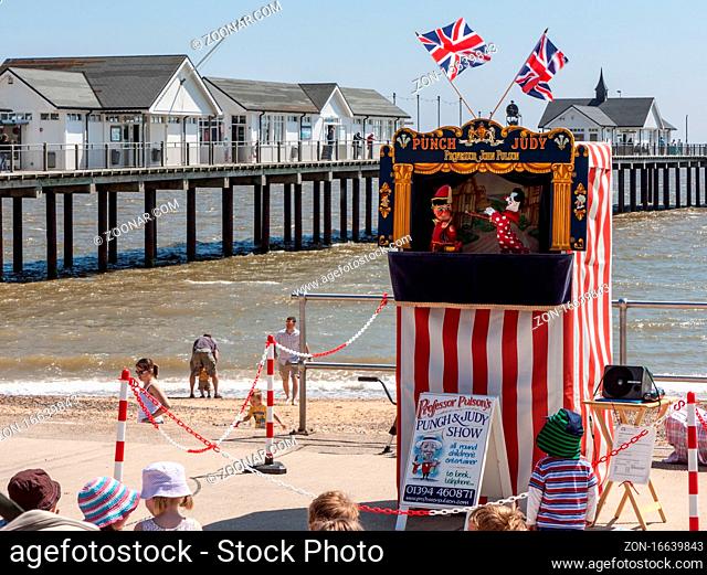 SOUTHWOLD, SUFFOLK/UK - JUNE 2 : Punch and Judy show in Southwold on June 2, 2010. Unidentified people and children