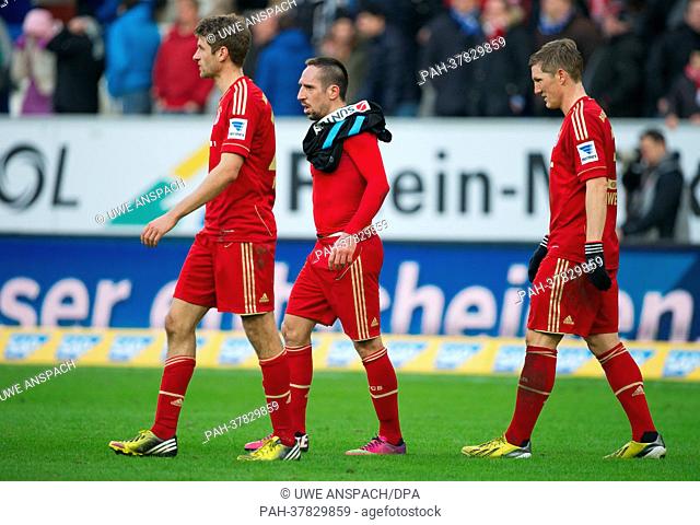 Munich's Thomas Mueller (L-R), Franck Ribery and Bastian Schweinsteiger leave the pitch after the German Bundesliga soccer match between TSG 1899 Hoffenheim and...