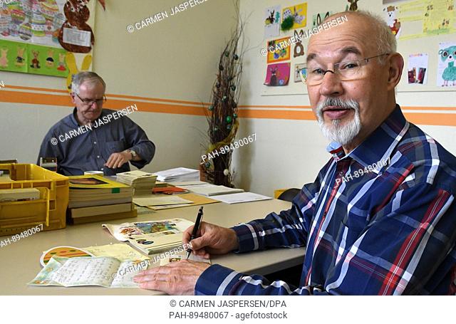 Hans-Hermann Dunker and other volunteers at work in the post office in Zeven, Germany, 30 March 2017. Letters addressed to Hanni the Bunny arrive here from...