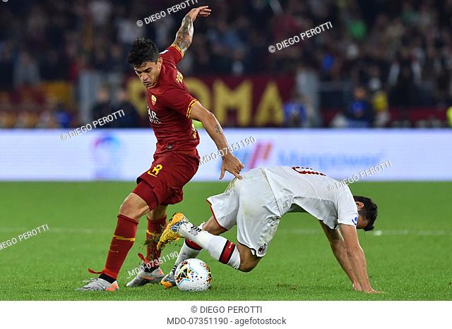 Roma football player Diego Perotti and Milan football player Hakan Calhanoglu during the match Roma-Milan in the Olimpic stadium