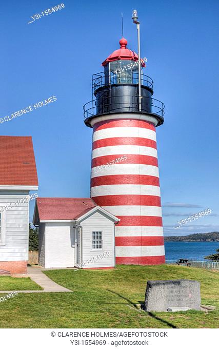 West Quoddy Head Light protects the eastern-most point of land in the United States, located in Lubec, Maine