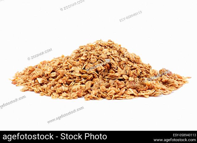 A heap of granola on a white background