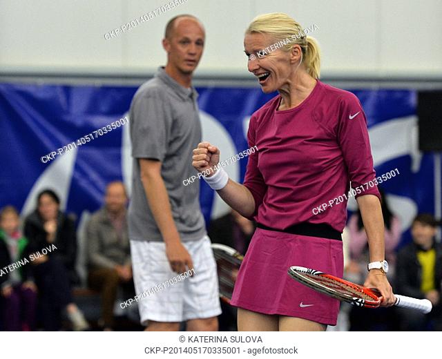 Wimbledon winner Jana Novotna (pictured) of Czech Republic is seen during the friendly tennis match against former world no