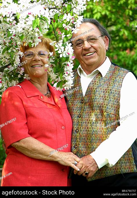 Older married couple in park, posing, portrait, friendly, smiling, Older married couple, posing, portrait, friendly, smiling