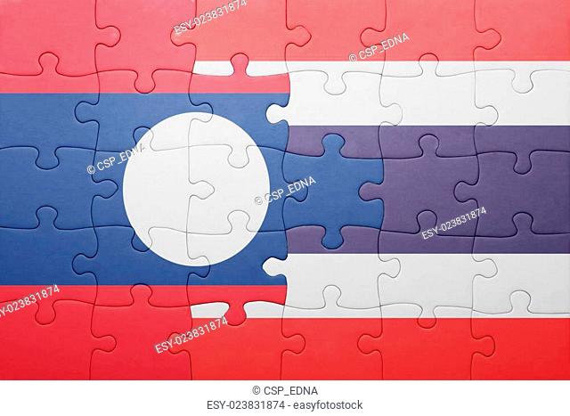 puzzle with the national flag of laos and thailand