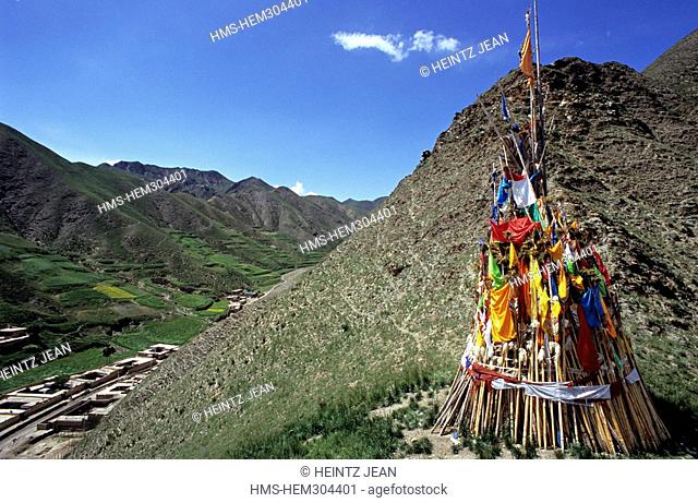 China, Qinghai Province, Xiahe, prayer flags above the monastery of Labrang, one of the biggest in the world
