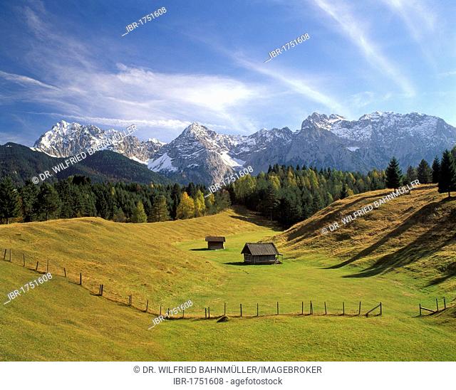 Humocky meadows near Klais in front of the Karwendelgebirge range, Upper Bavaria, Germany, Europe