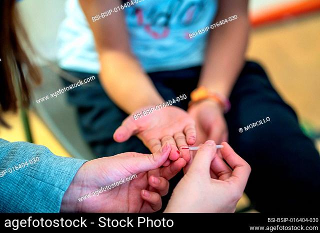 Rapid serologic test for 5-11 year old COVID-19 vaccination at a vaccination centre