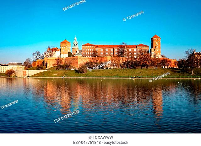 Famous landmark Wawel castle seen from Vistula, Krakow, Poland