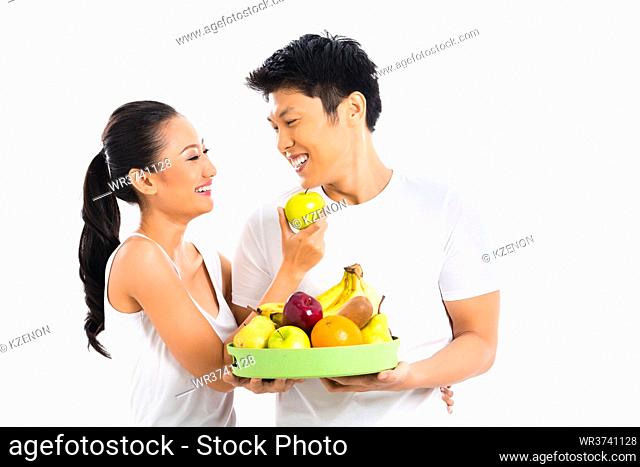 Asian couple eating and living healthy