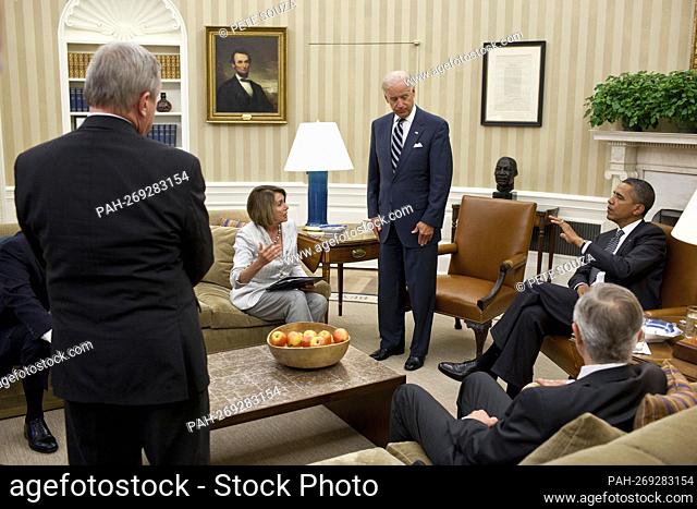 United States President Barack Obama and Vice President Joe Biden meet the Democratic leadership in the Oval Office to discuss ongoing efforts to find a...