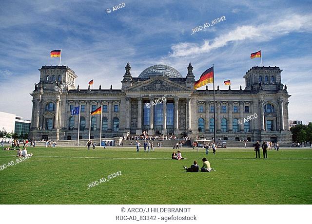Berlin Reichstag Building with dome and German flags Berlin Germany Architekt: Paul Wallot