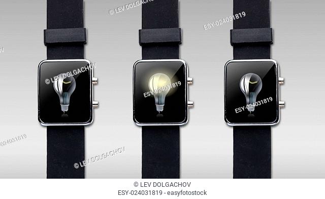 modern technology, object and media concept - close up of black smart watch with light bulb on screen