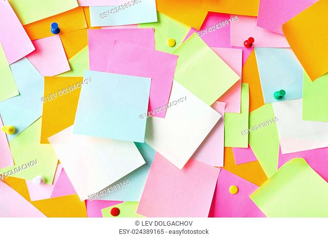 business, information, memo, management and education concept - close up of colorful paper stickers