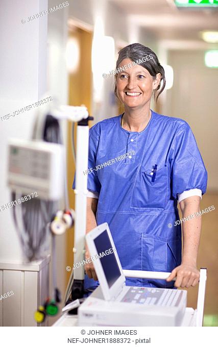 Portrait of smiling mature nurse