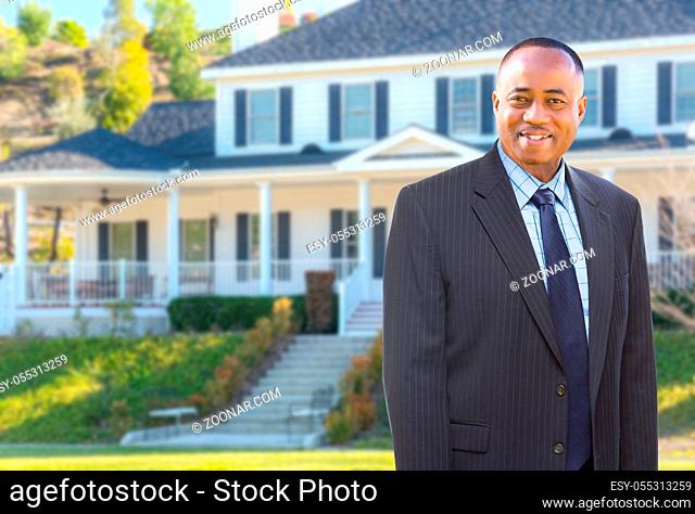 African American Agent In Front of Beautiful Custom House